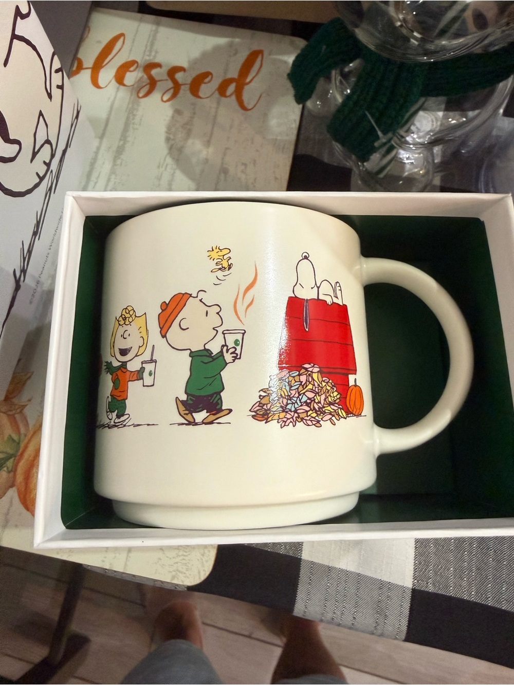 Starbucks Cream Peanuts Holiday Ceramic Mug with Red Artwork